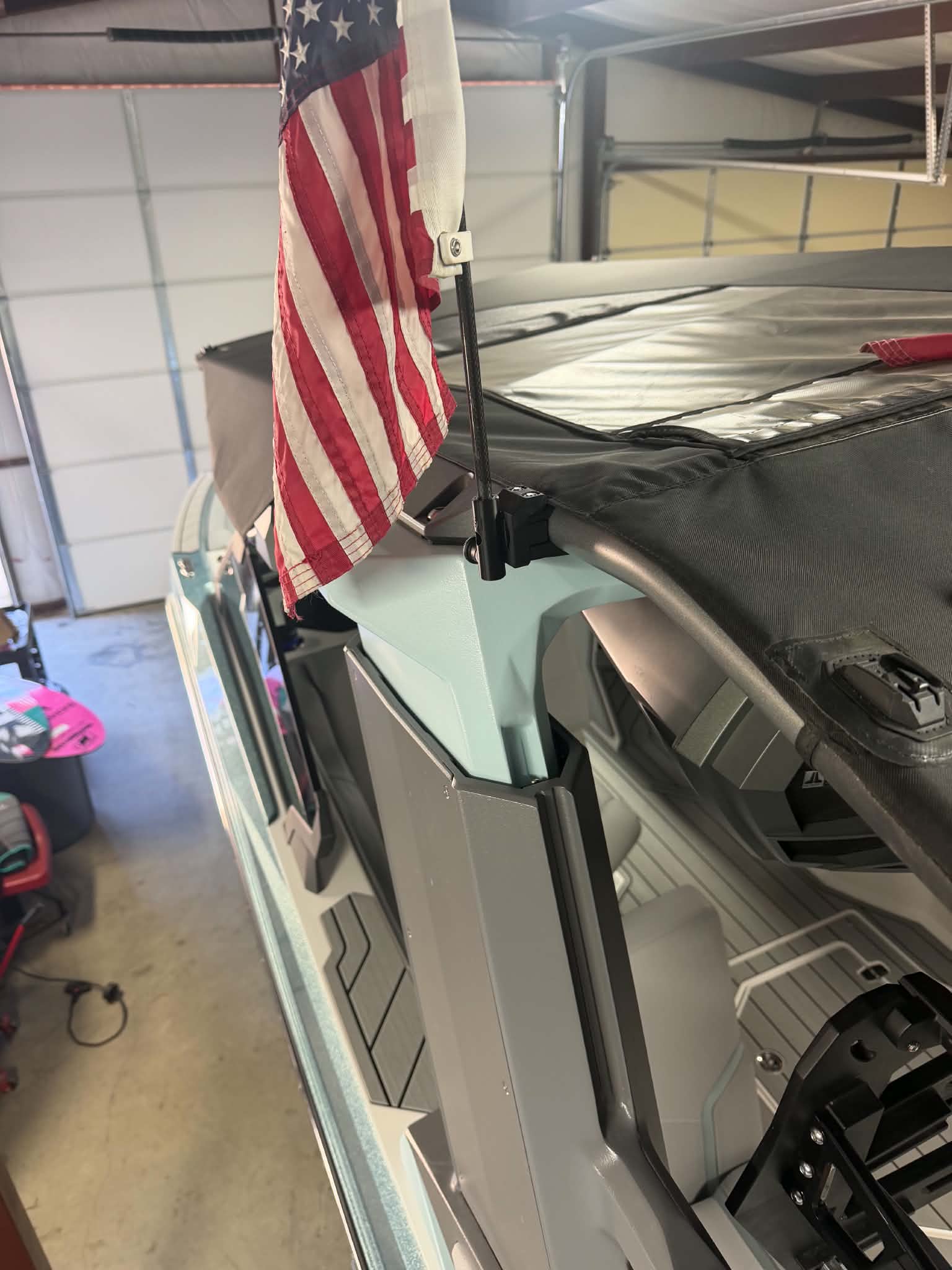 Flag mount attached to a bimini tube