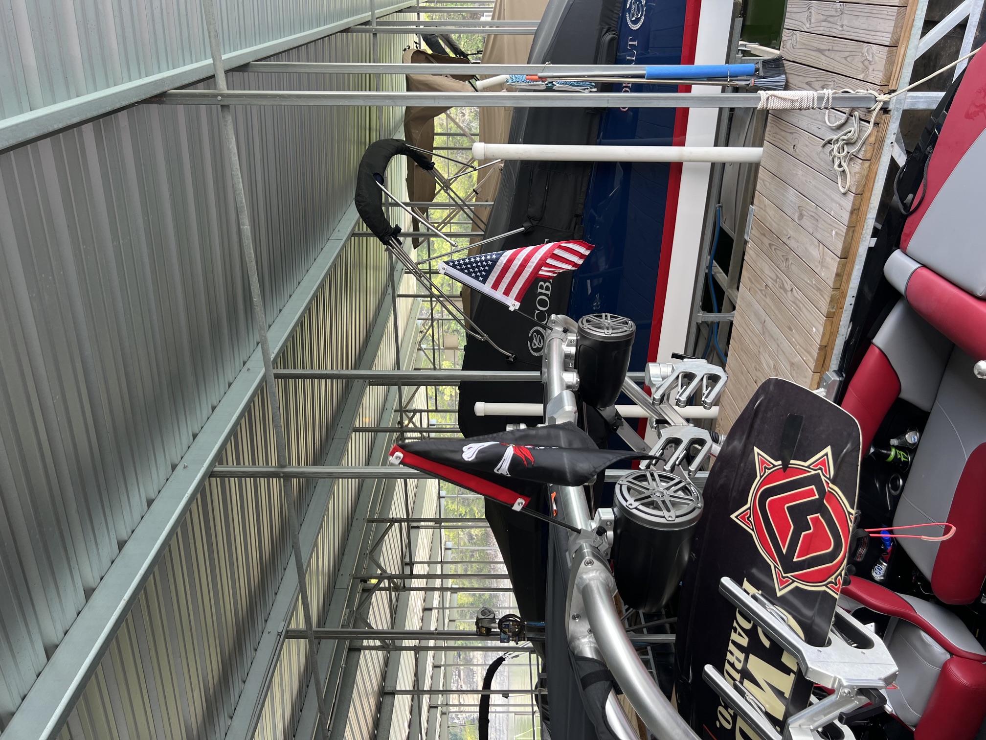Boats with flags at a marina