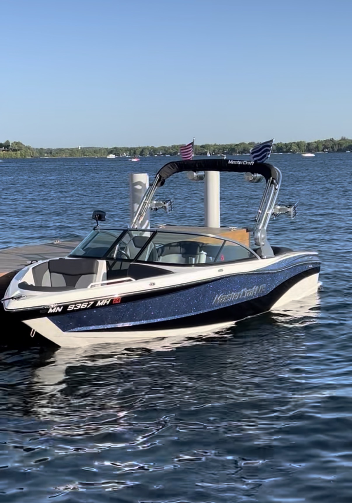 MasterCraft boat floating on the lake